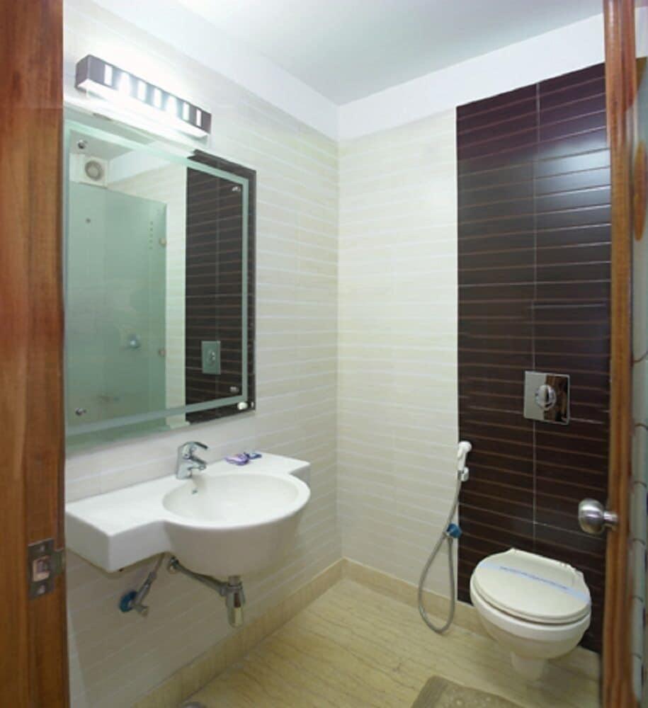 Hotel Apra Deluxe New Delhi Værelse billede